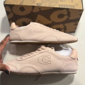 Coach women’s Blush Flat Sneakers